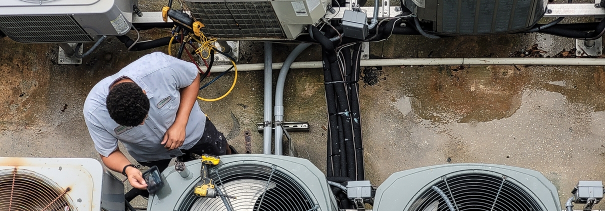 commercial hvac system being maintained