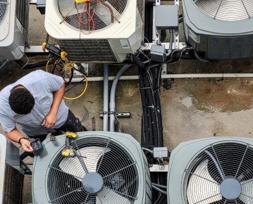 commercial hvac system being maintained